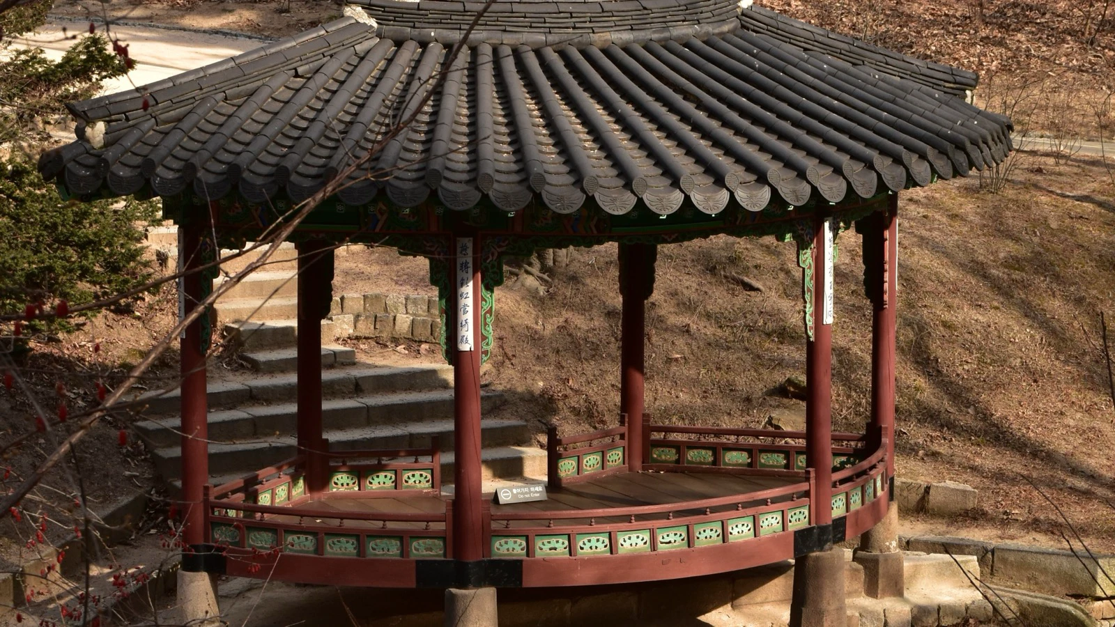 A pavilion beside a frozen pond in Changdeokgung Secret Garden