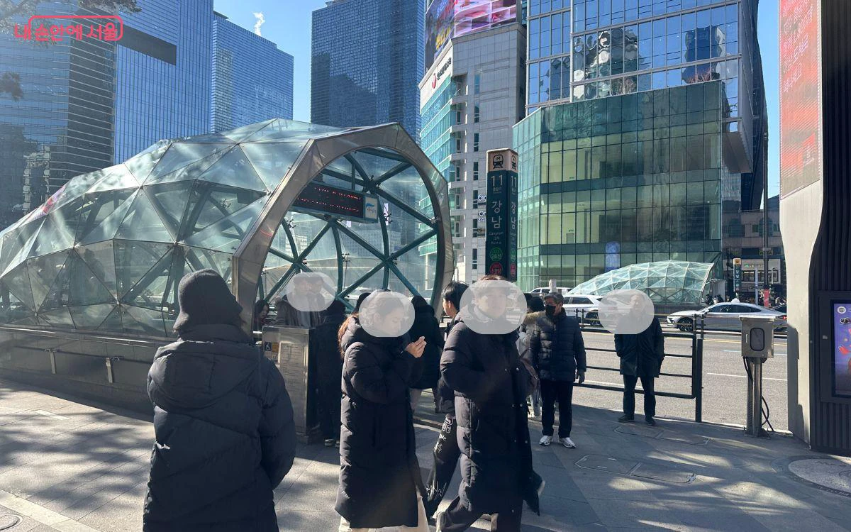 Gangnam Station Exit 11 surrounded by glass office towers