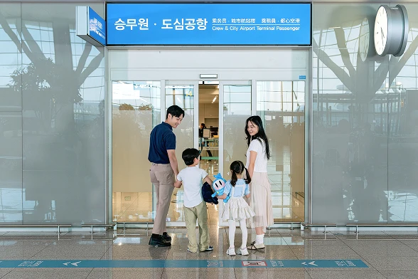 Travelers entering the dedicated city airport terminal departure lane at Incheon Airport