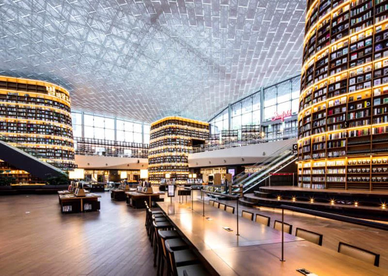 Tall bookshelves and seating inside Starfield Library at COEX in Seoul