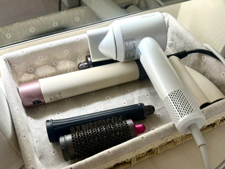 Hair dryer and styling attachments set out after scalp care