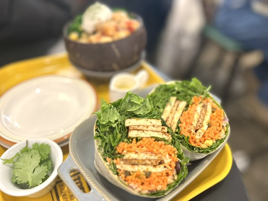 Tofu wrap packed with lettuce and shredded carrot at By Tofu in Seoul's Haebangchon neighborhood