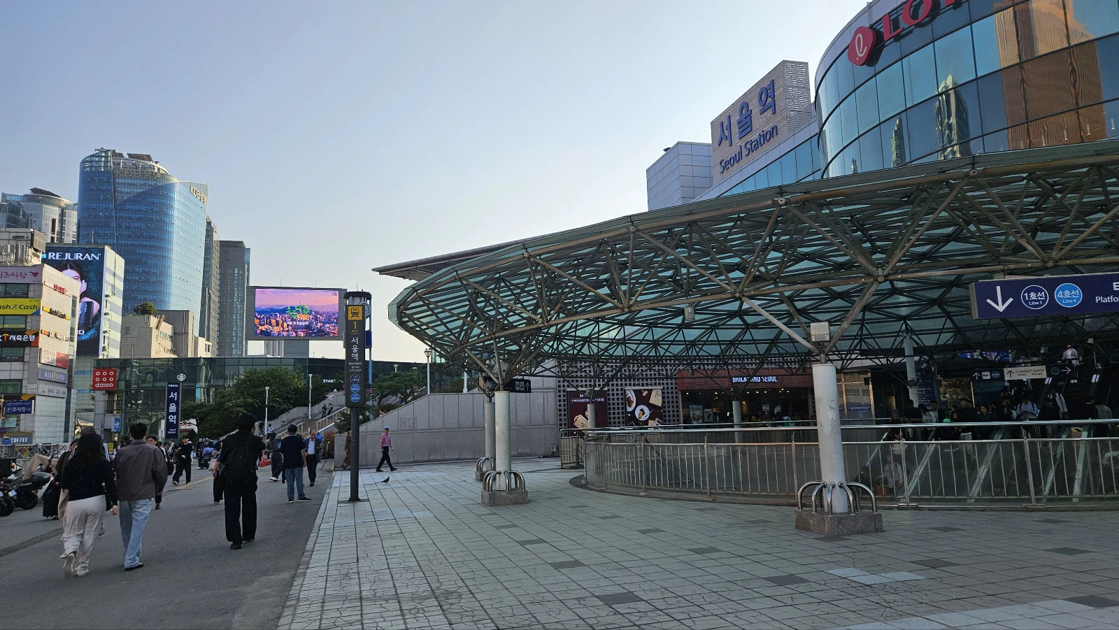Seoul Station exterior and subway entrances in afternoon light in October 2024