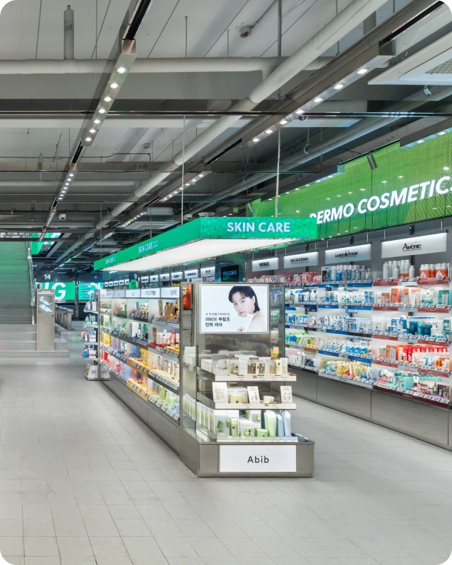 Olive Young skincare floor with multi-brand shelves and clearly marked categories
