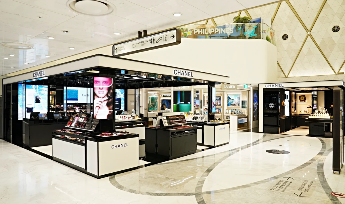 Chanel cosmetics counters inside Lotte Duty Free Myeongdong in June 2026