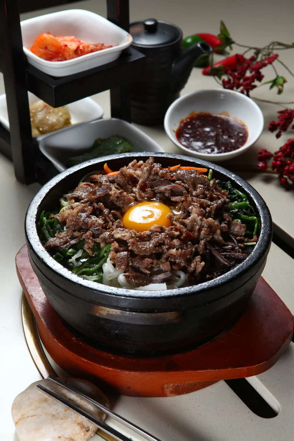 Bibimbap in a black stone bowl, used as a visual reference for the seasoned bibimbap flavor family
