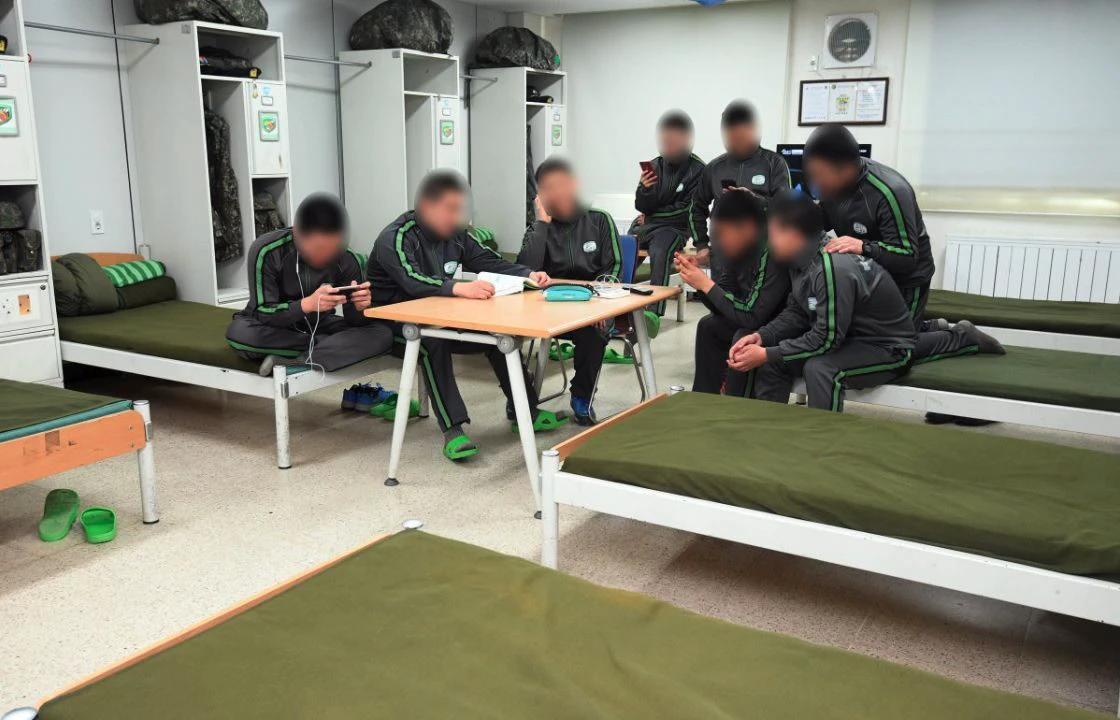 South Korean soldiers use smartphones in a barracks during their off-duty period.