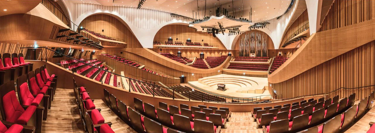 Vineyard-style auditorium and pipe organ inside Lotte Concert Hall