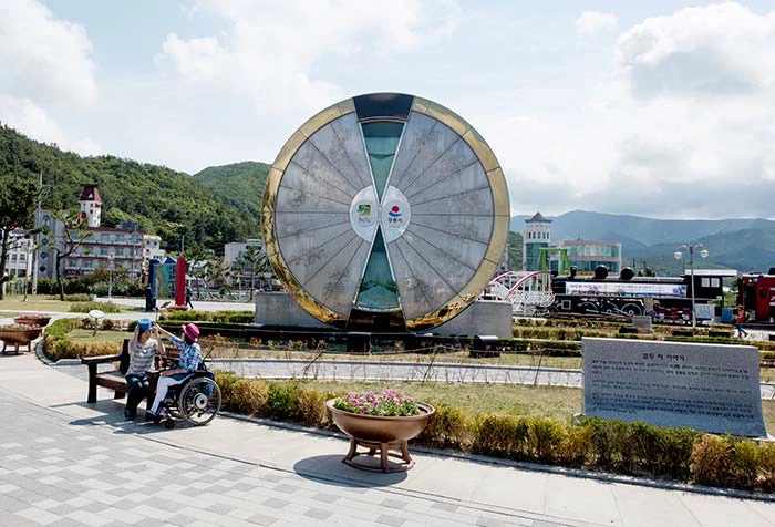Giant annual sandglass at Jeongdongjin Sandglass Park beside the rail line